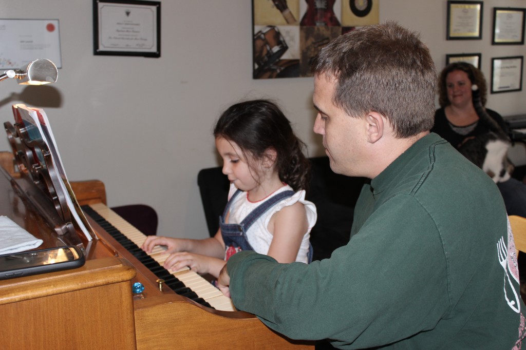 mr will teaching piano lesson