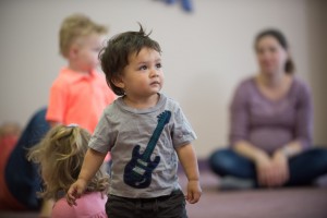 child with guitar shirt