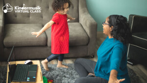 child and grown up having fun at home with kindermusik virtual classes
