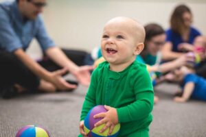 Baby playing with chime ball